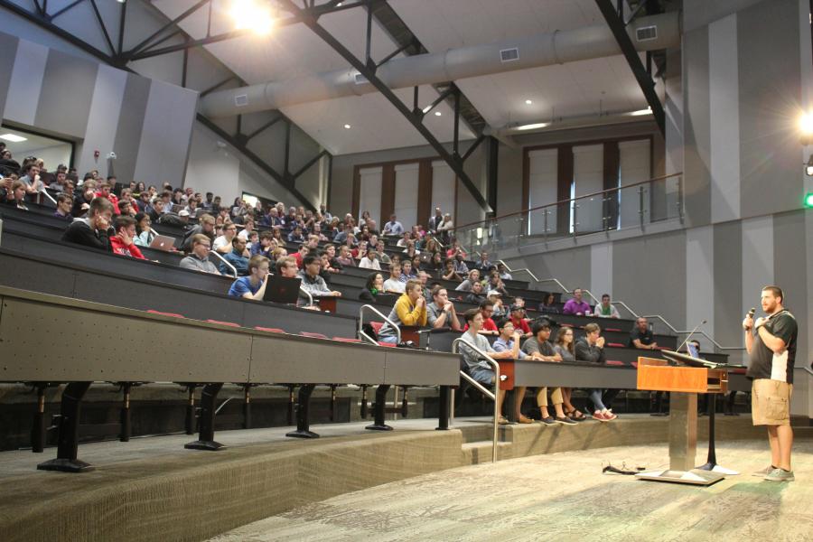 Students listen as tech companies pitch their organizations and available opportunities. (Photo by Fred Knapp, NET News)