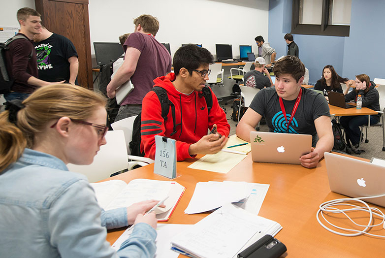 Students talking in the Student Resource Center.