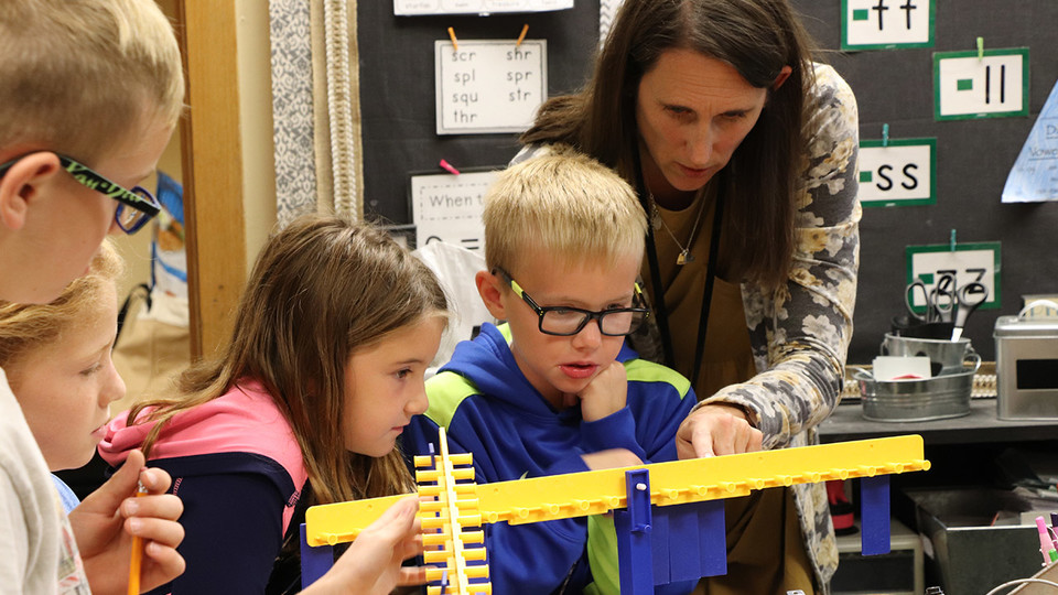 Jennifer Jones, a second-grade teacher at Gretna Elementary School, works with her students on a math lesson. Up to 15 rural Nebraska elementary teachers are being sought to participate in the NebraskaSTEM leadership development program at the University.