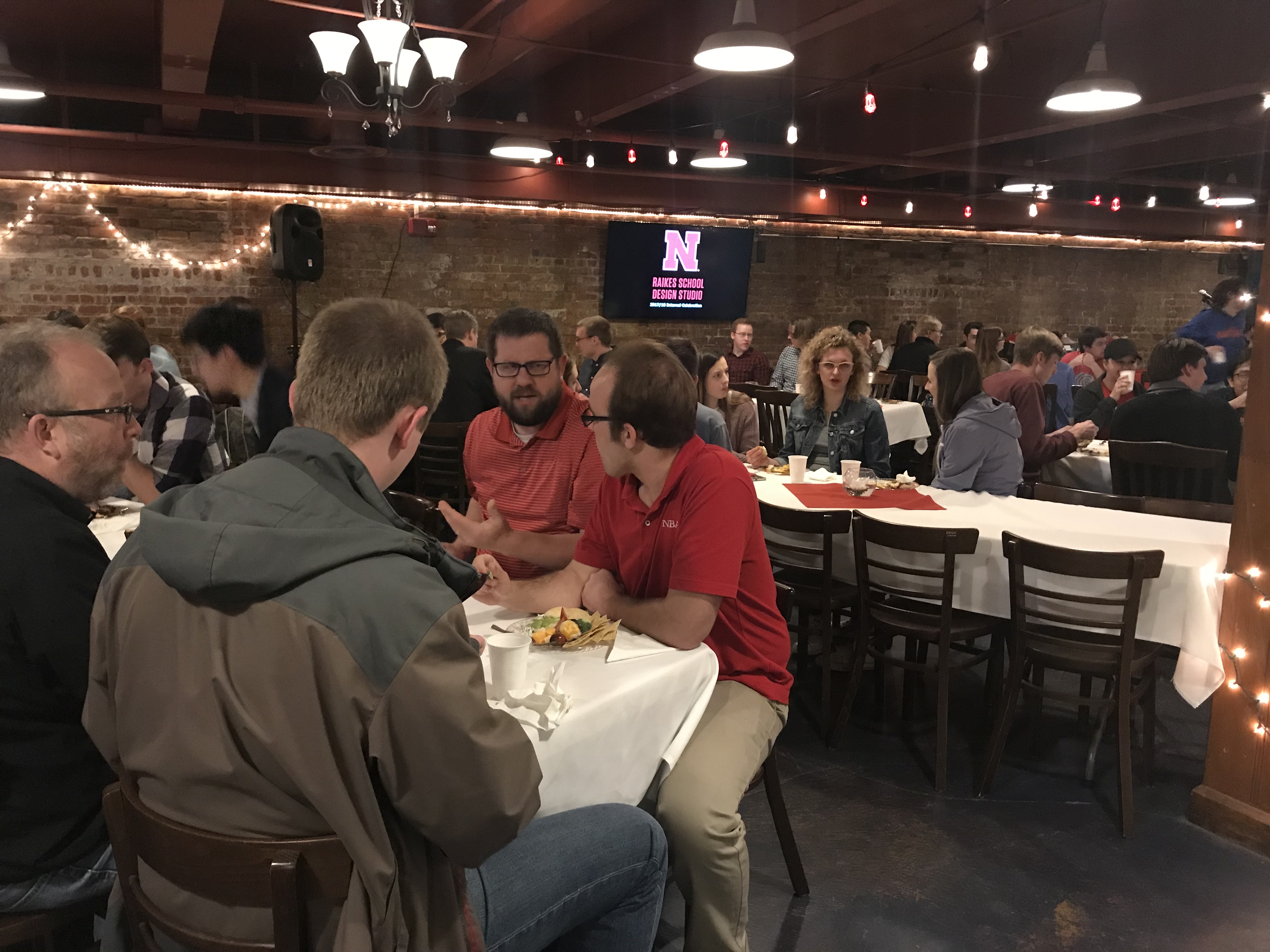 Student enjoying dinner at the Talon Room during the Senior Design and Design Studio Awards Reception last Thursday.