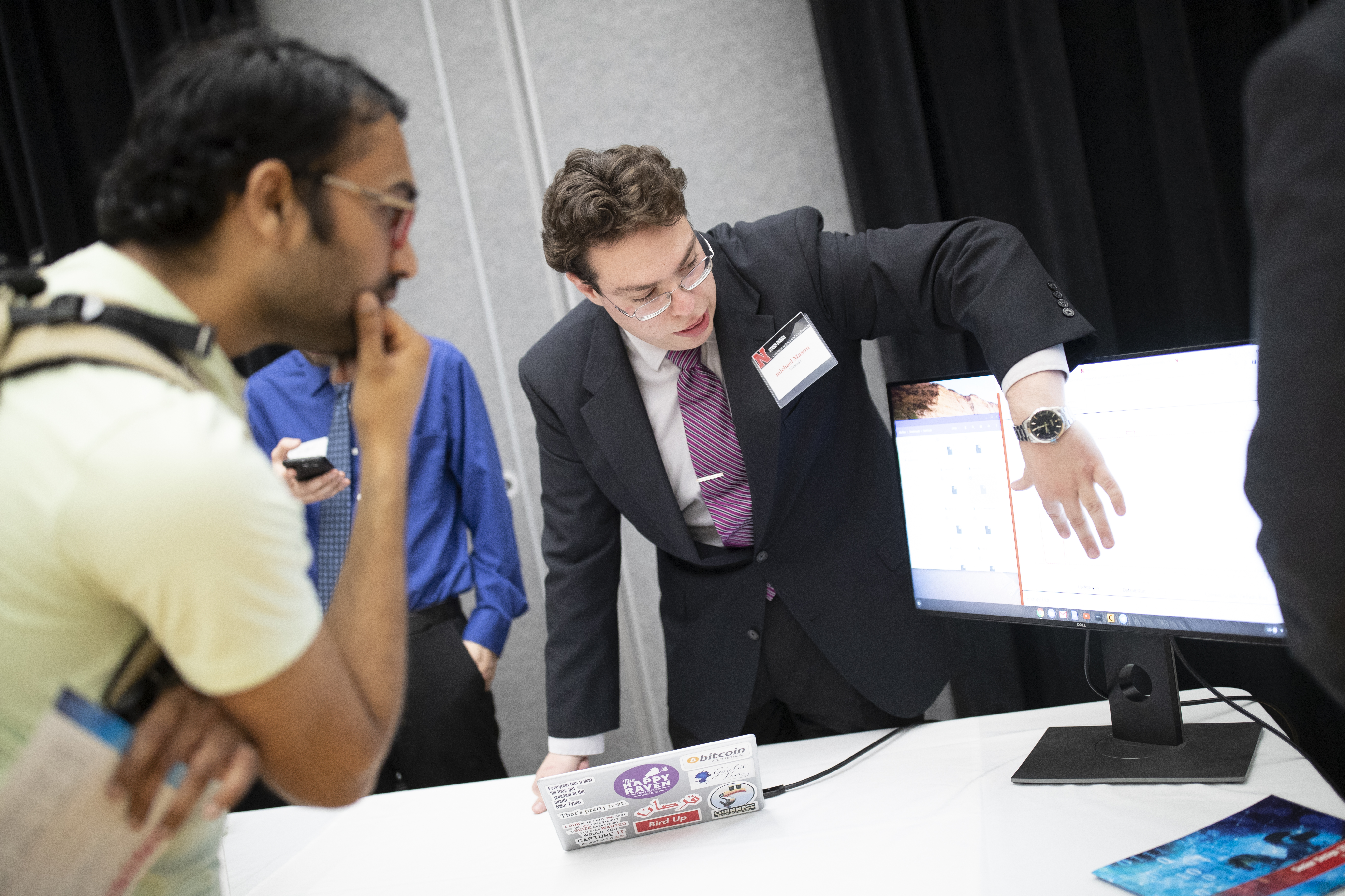 A student presents a project at the 2019 Senior Design Showcase.