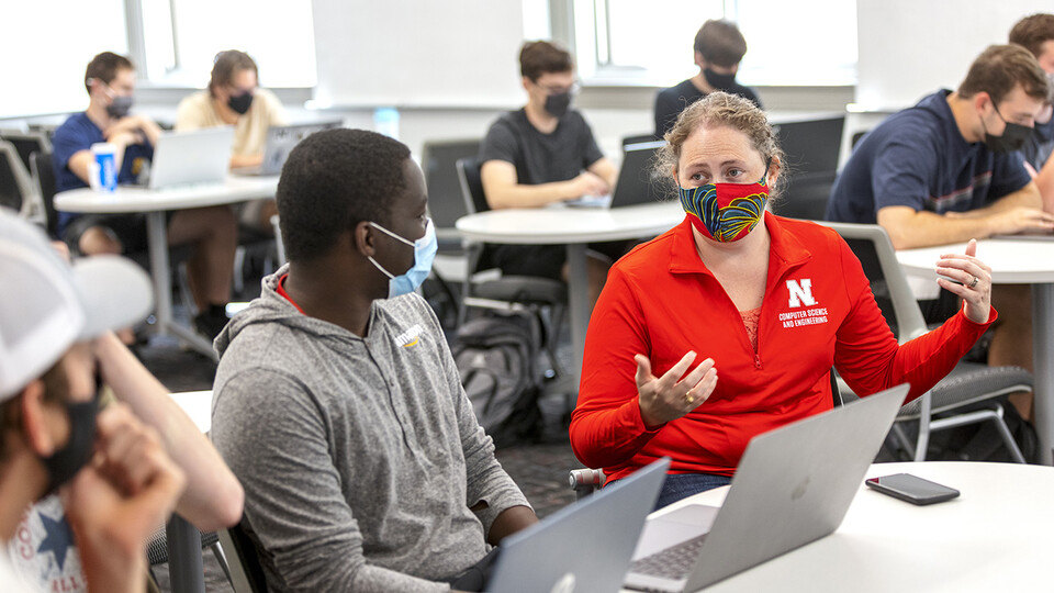 Students talk over scenarios in a Human-Computer Contact robotics course taught by Brittany Duncan, associate professor of computer science and engineering, on Sept. 8.