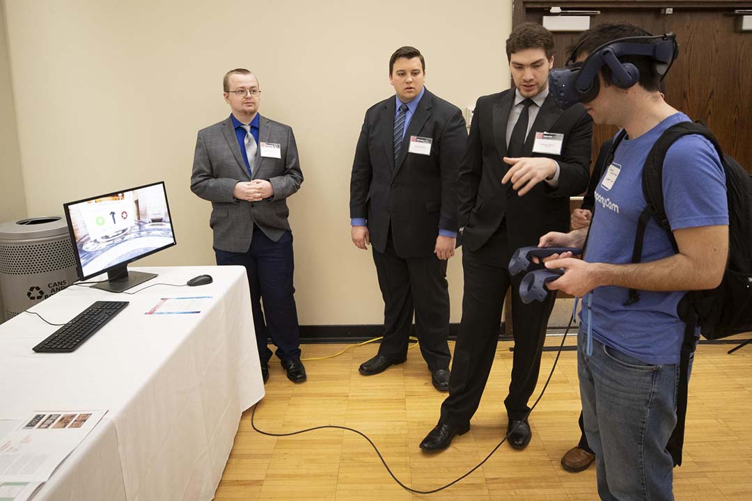 The NET Virtual Capitol Tour team demos their virtual reality app at the Showcase.