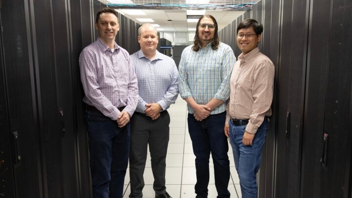 From left: Derek Weitzel, Garhan Attebury, Adam Caprez and Hongfeng Yu in the Holland Computing Center’s Lincoln site, located at the Schorr Center.